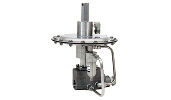 Industrial pressure regulator with a silver casing and tubing.