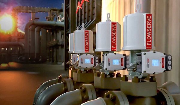 Flowserve valves in an industrial setting, with a bright orange glow in the background.