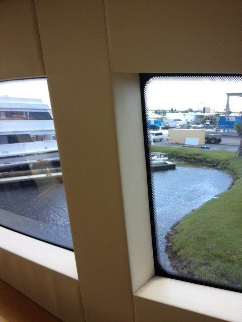 A window with a view of a body of water