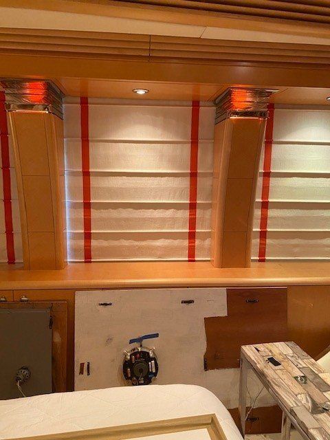 A room with red and white stripes on the walls