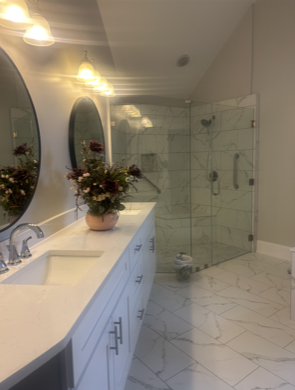 Bathroom enclosure and mirrors