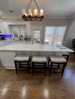 kitchen interior with tables and chairs 