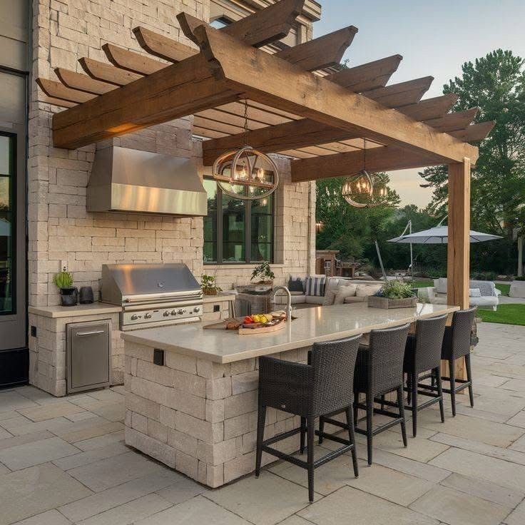 A large outdoor kitchen with a pergola over it