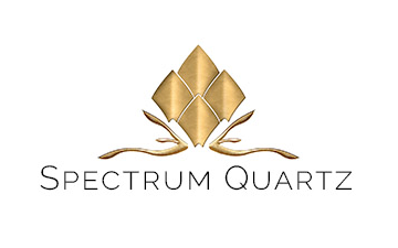 Gold logo for Spectrum Quartz with geometric diamond shape above text.
