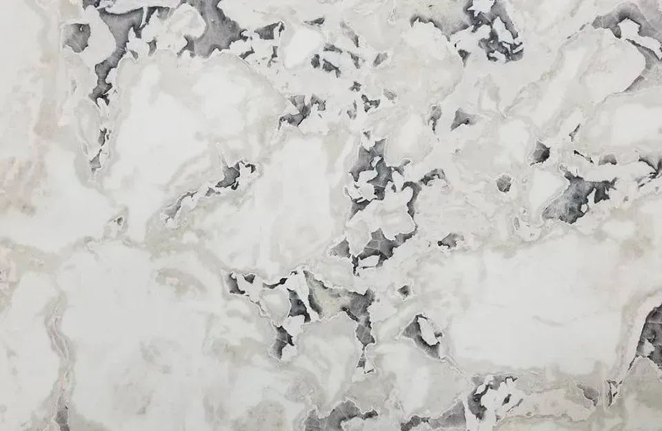 White and gray marble slab with dark gray veining.