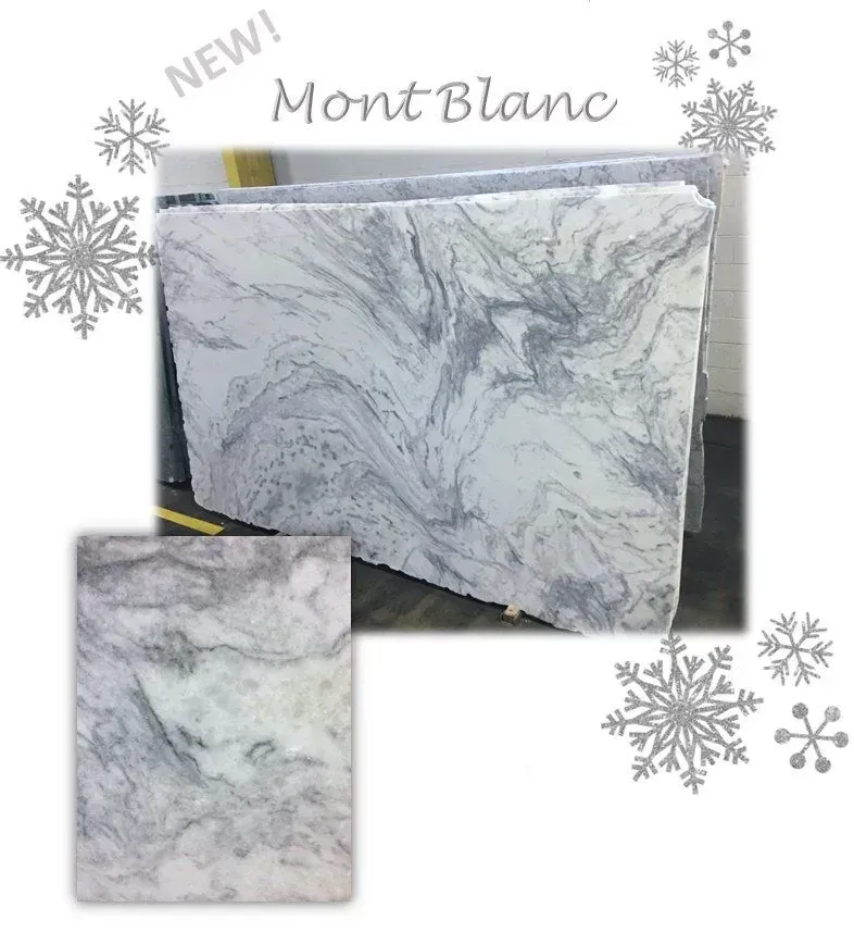 Large slabs of Mont Blanc marble with white and gray swirling patterns, snowflakes.