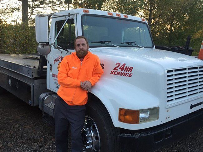 Towing truck and staff