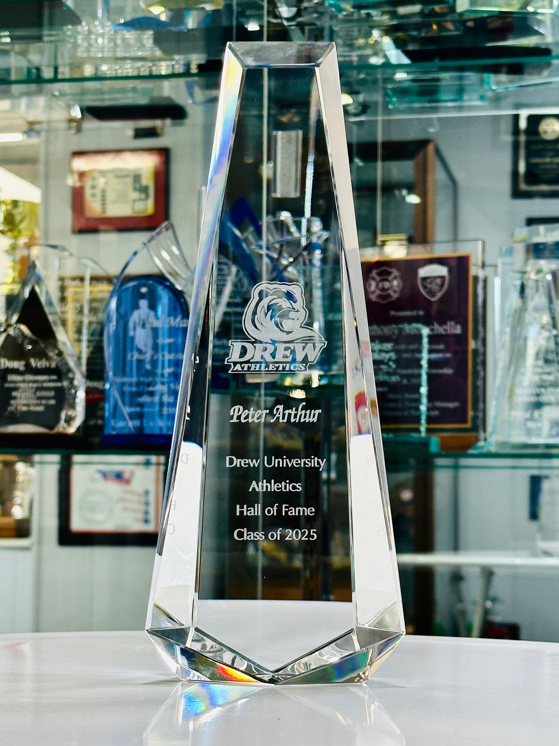 Clear glass award with Drew Athletics logo and text: Zeke Arter, Alma Mater, Medal of Honor, Class of 2023.