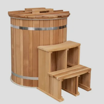 Wooden hot tub with matching step stool and side shelves, shown on a plain background
