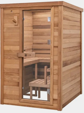 Wooden outdoor sauna with glass door and bench seating inside