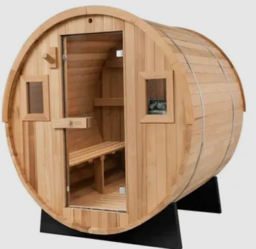 Round wooden barrel sauna with open door and bench seating inside, on a black base