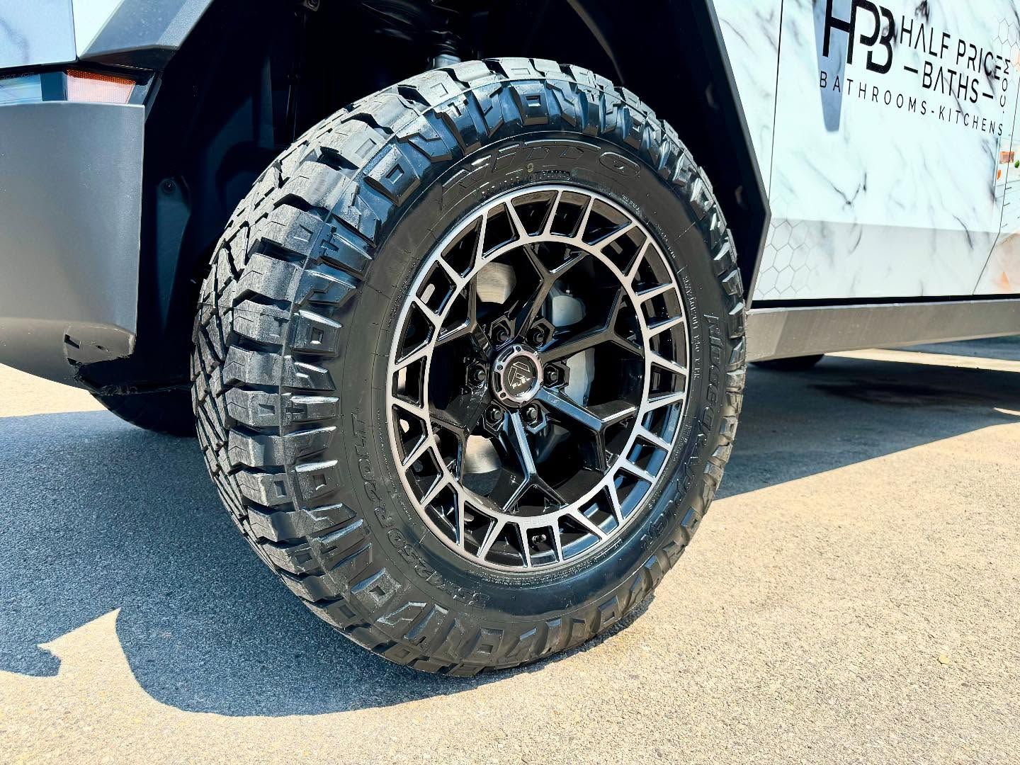 A close up of a tire on a truck.
