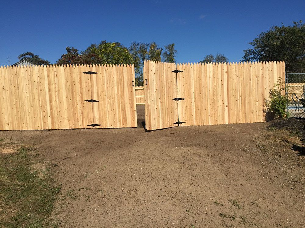 Wooden fence with gate.