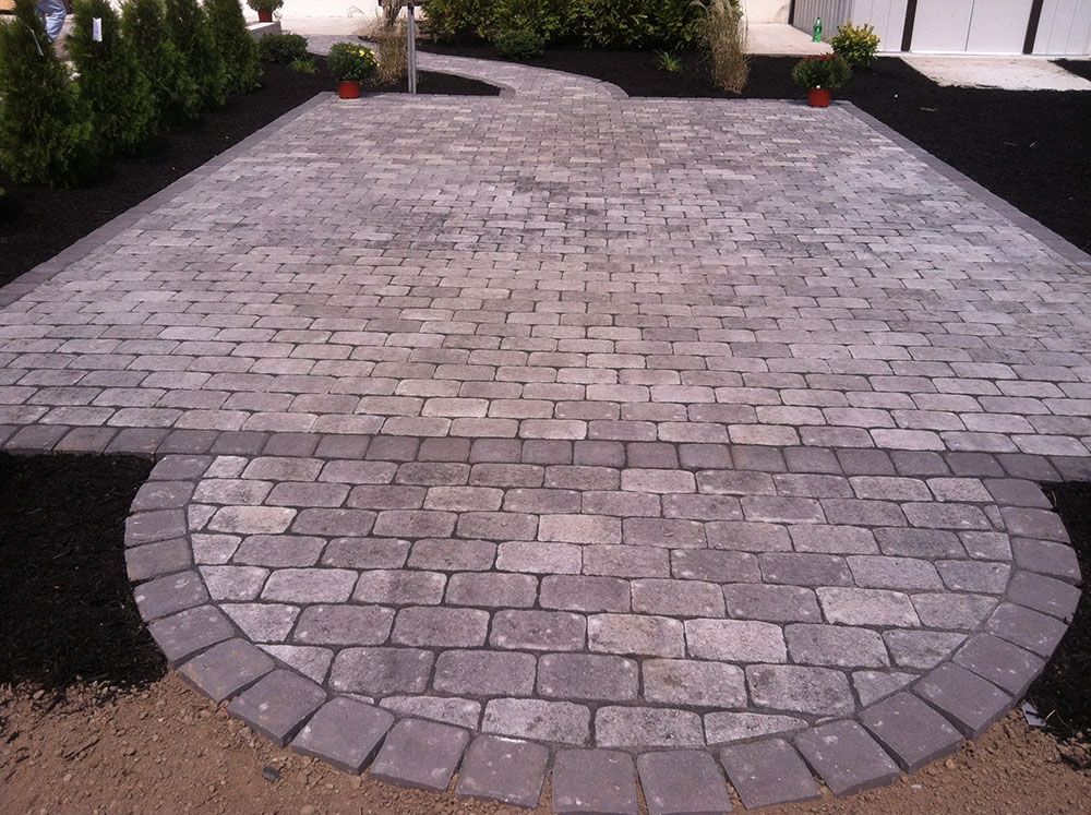 A brick patio, providing an elegant and functional space.