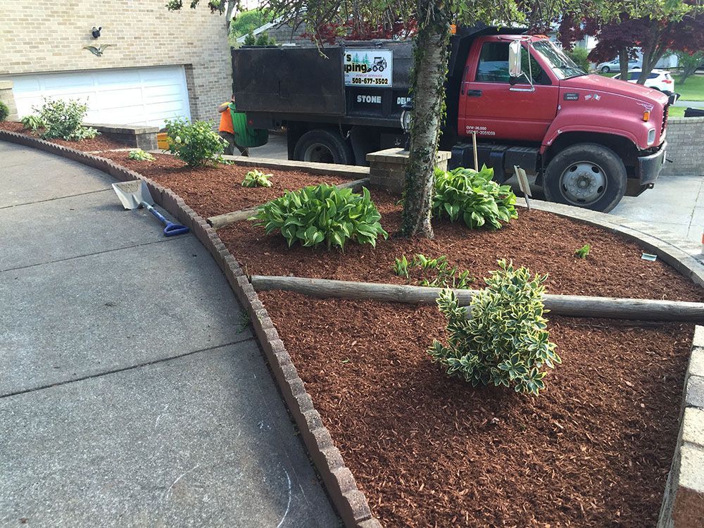 Landscape mini garden with red truck.