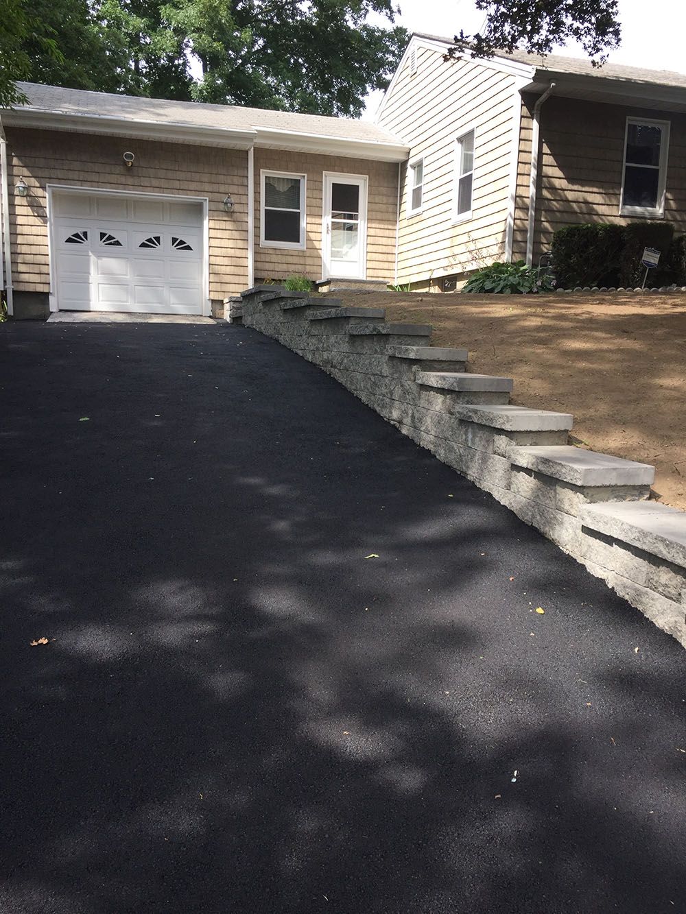 Asphalt driveway.