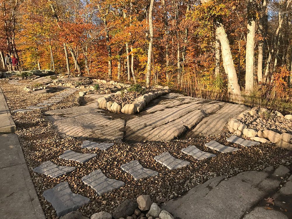 Stone garden and trees.