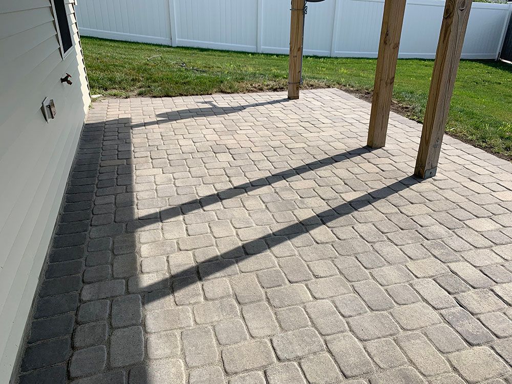 Concrete tile patio floor.