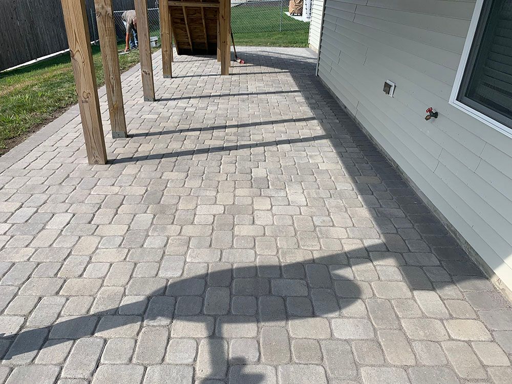 Concrete tile patio floor.