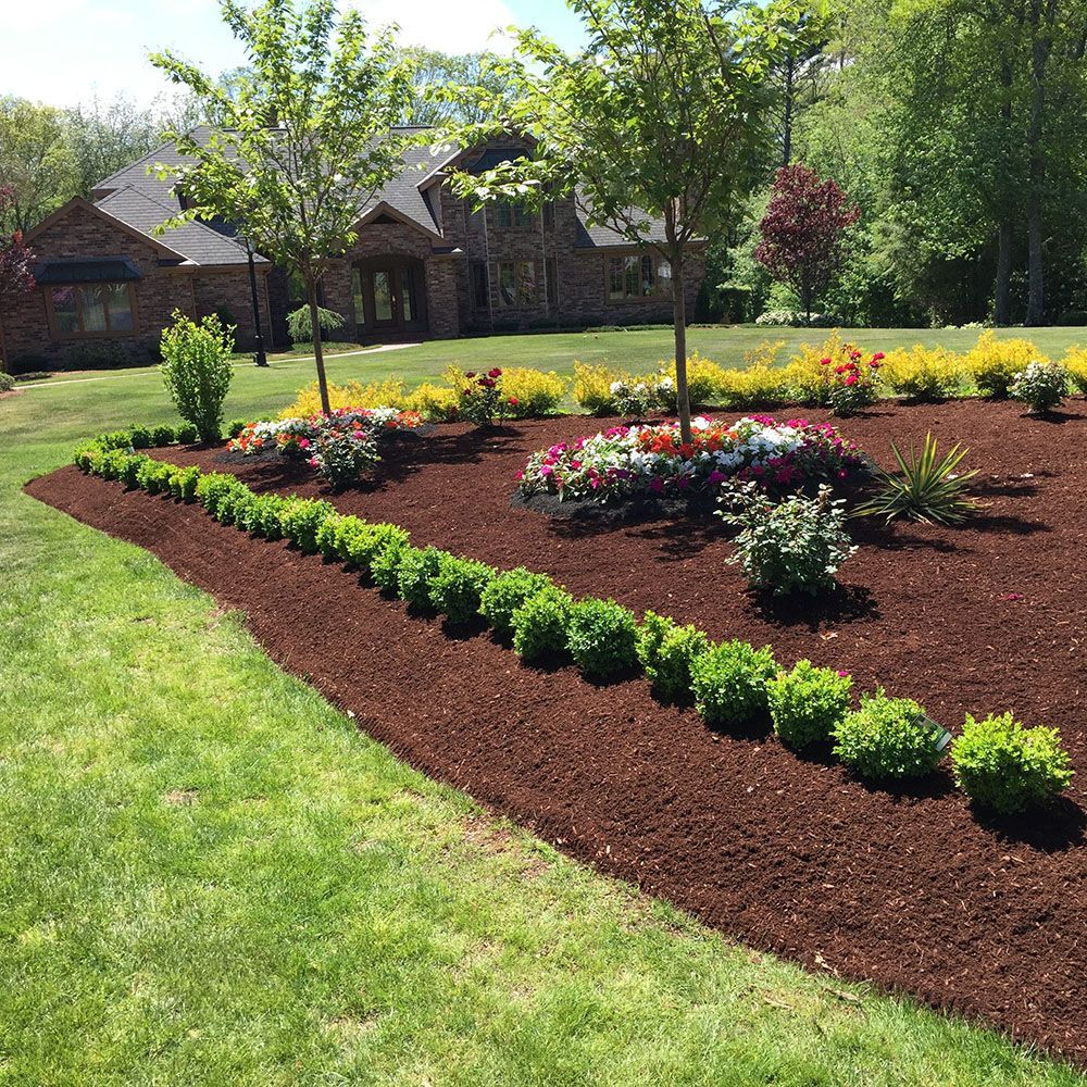 A landscaping design featuring colorful flowers.