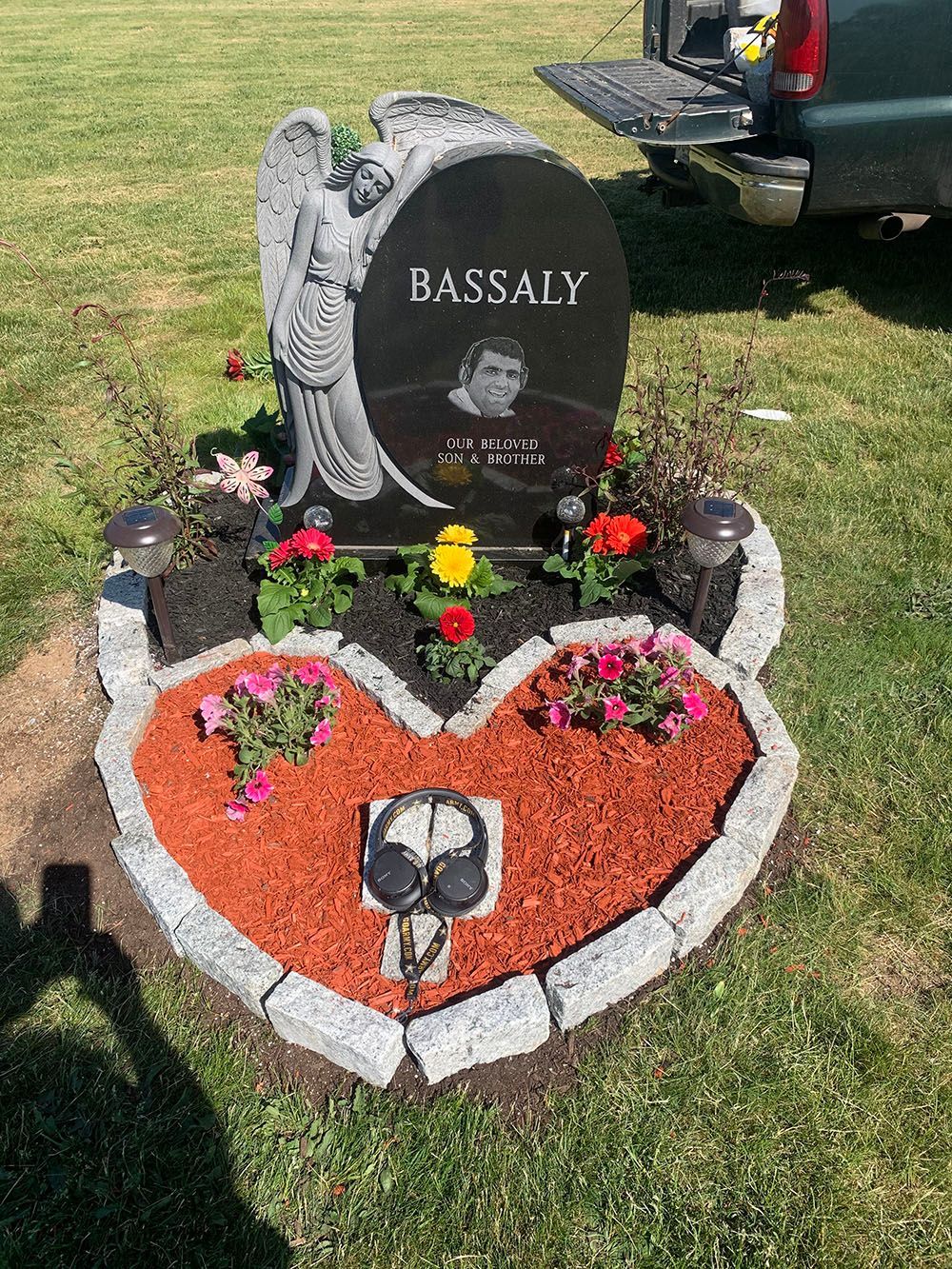 A heart-shaped stone memorial.