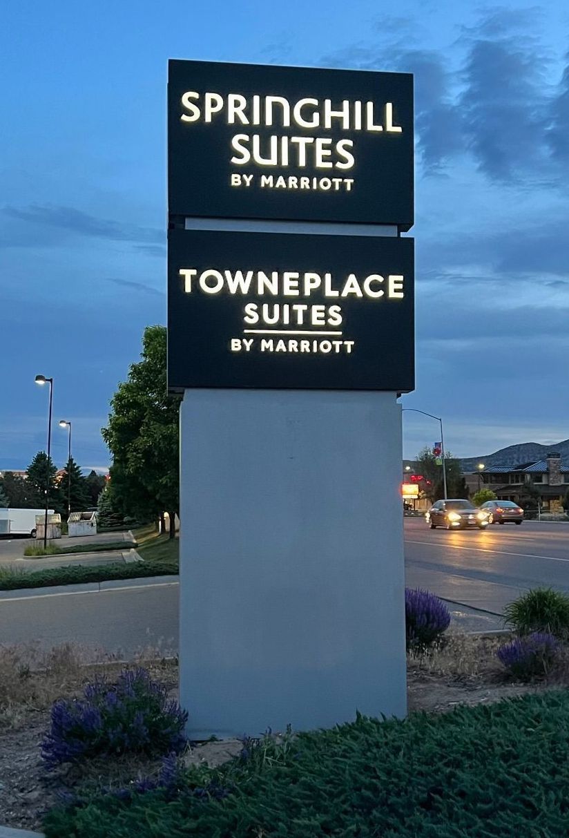 A sign for springhill suites and townplace suites by marriott