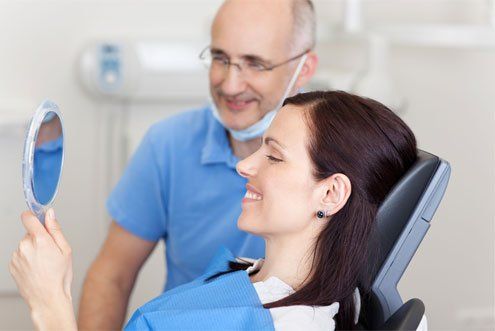 Dentist And Patient Smiling