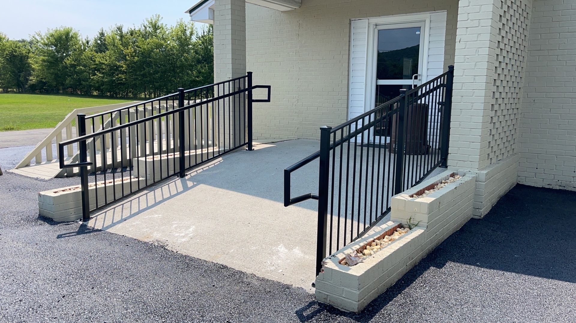 there is a ramp leading to the door of a building