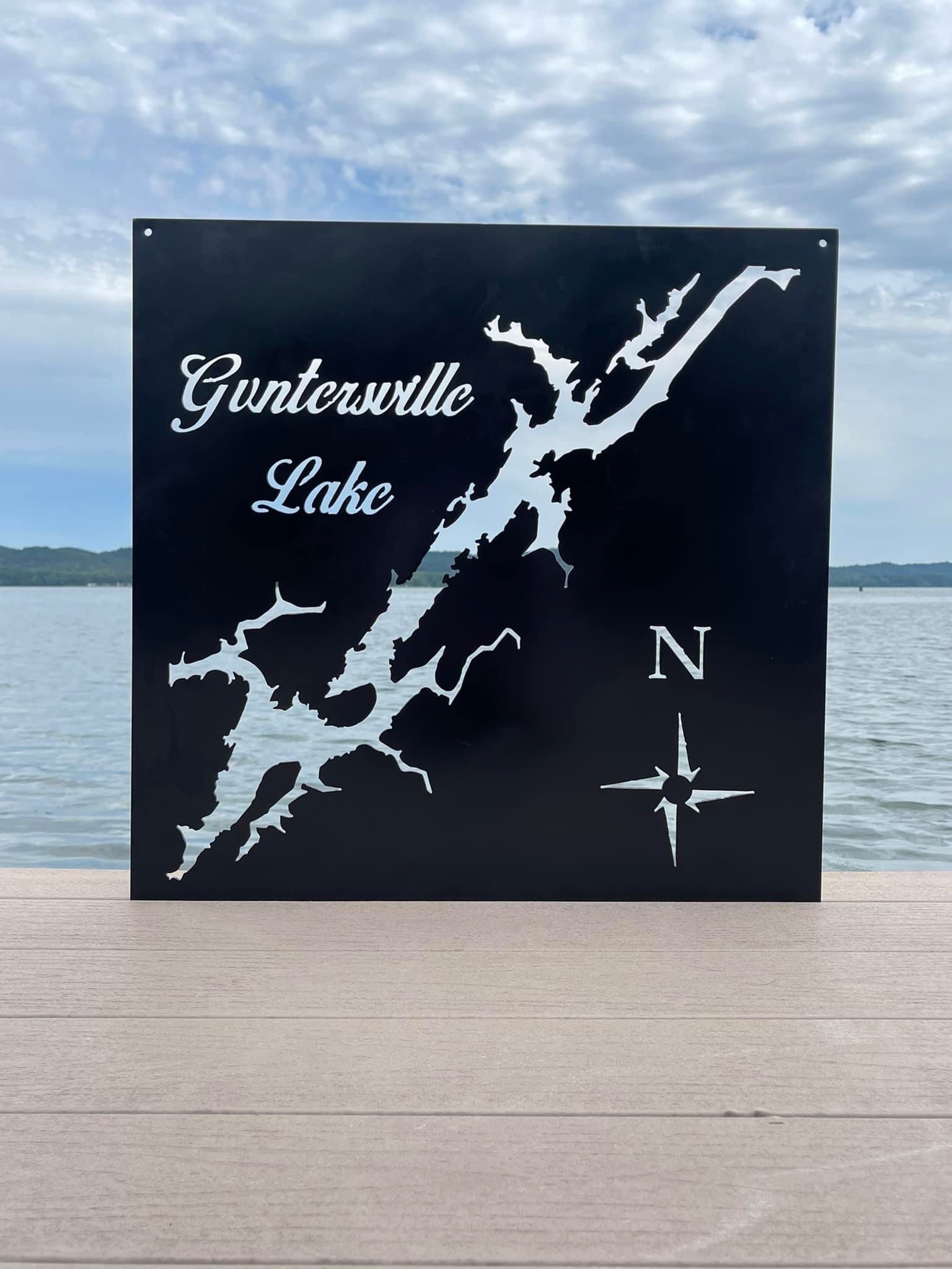 a sign that says Guntersville Lake on it