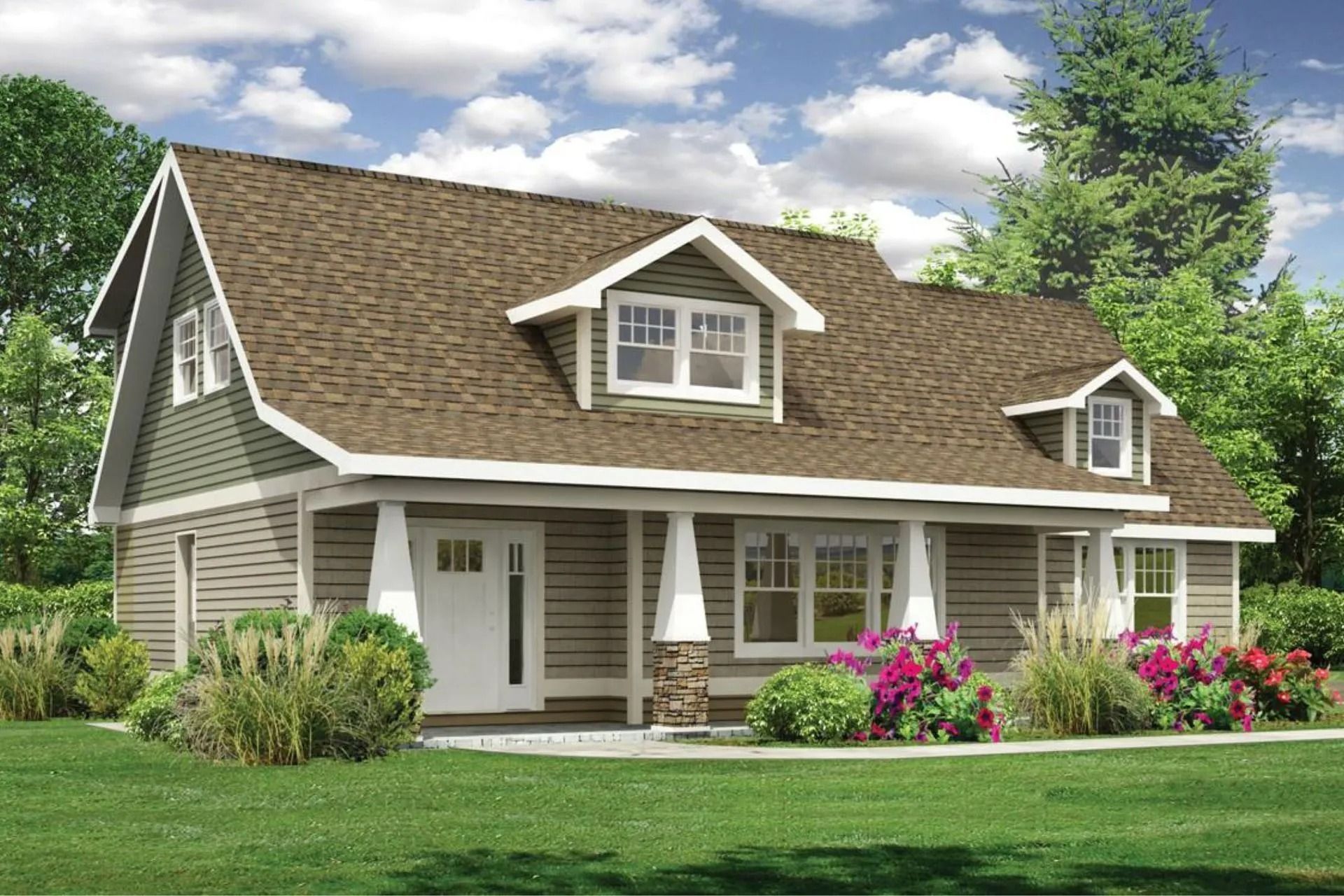 Cottage style house with a brown roof, green siding, white trim, and a small front porch, in a grassy setting.
