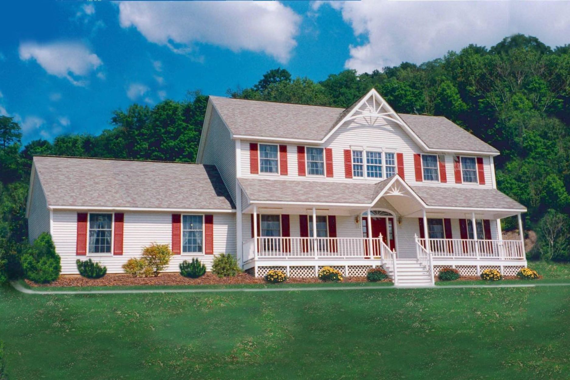 Two-story white house with red shutters and porch, set on a green lawn with trees in the background.