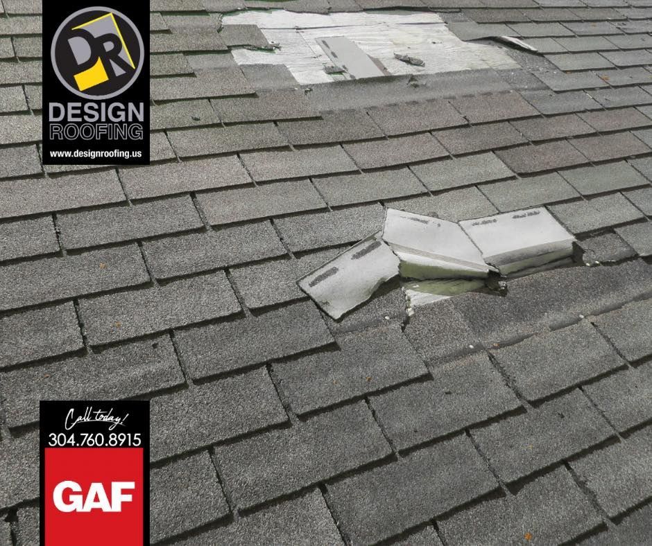 A damaged asphalt shingle roof with missing and broken shingles, likely needing repair. A company logo and contact information are visible.