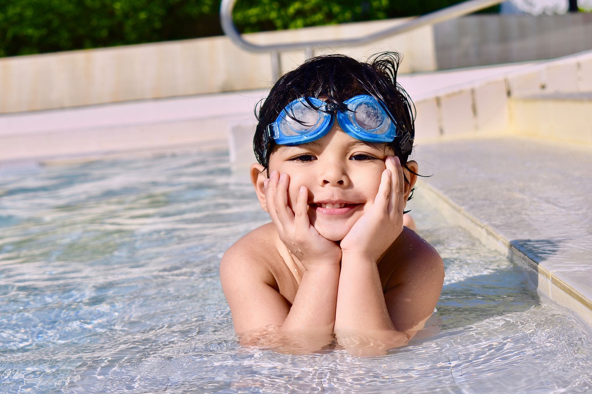 A boy on a swimming pool