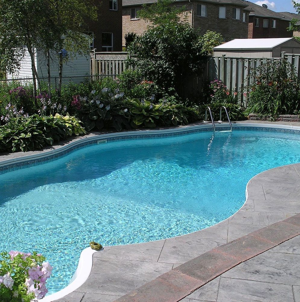A pool with new tile deck