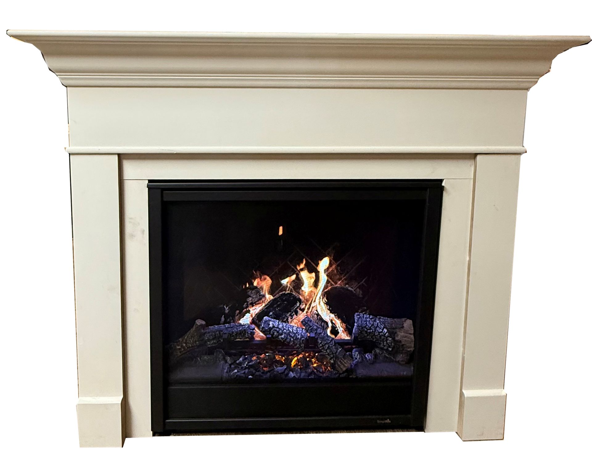 A white fireplace mantel surrounding an electric fireplace insert with a realistic glowing fire display.