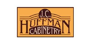 Logo for J.C. Huffman Cabinetry, brown lettering on an orange background, rectangular shape.