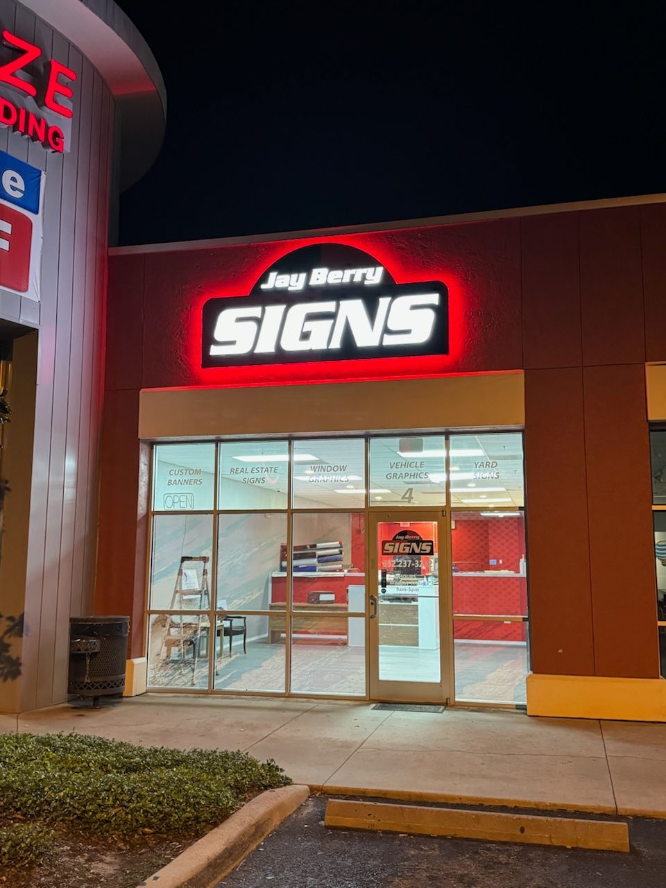 jay berry signs at night - ocala