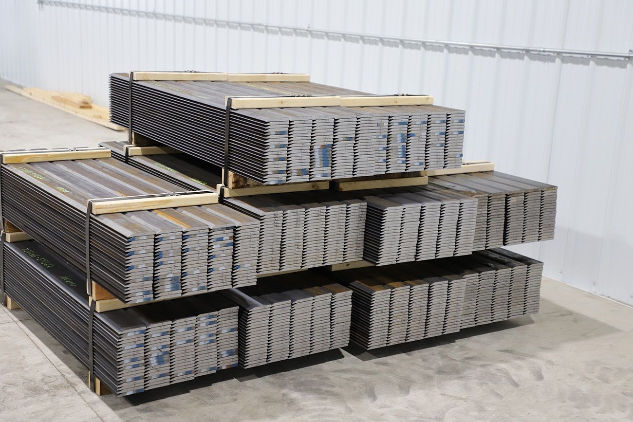 A stack of metal sheets sitting on top of each other