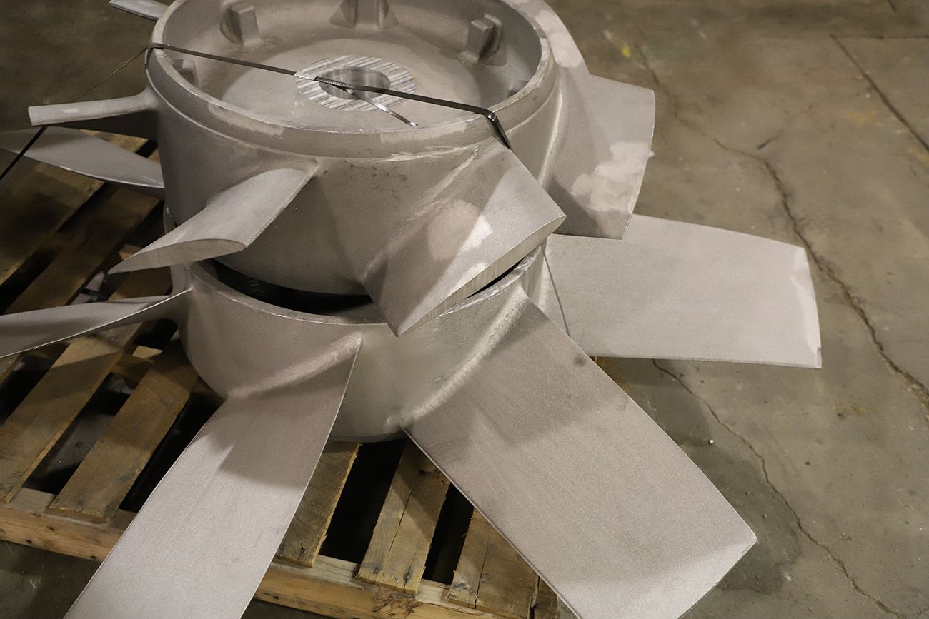 Forged propeller fan hub machined for assembly