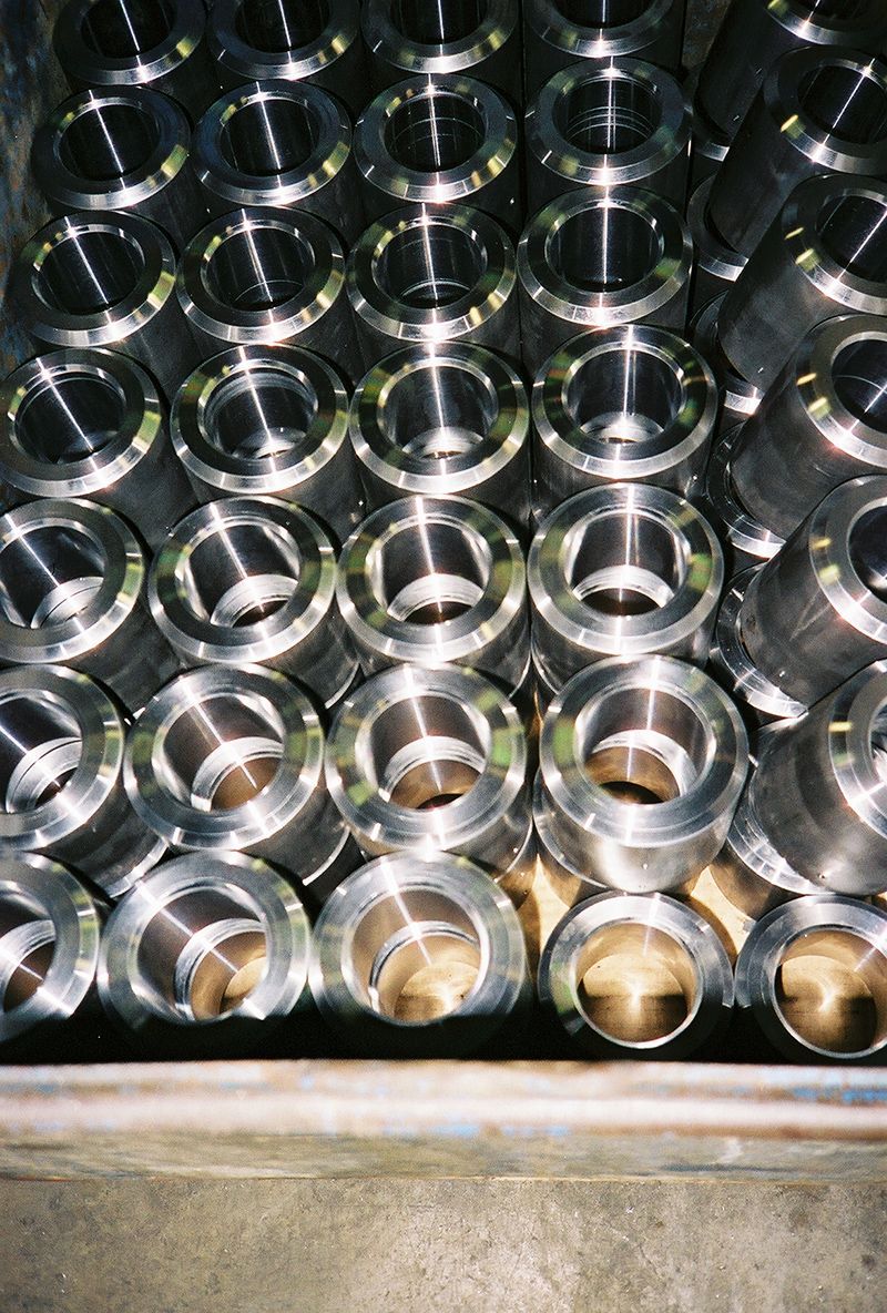 A bunch of metal cylinders are stacked on top of each other