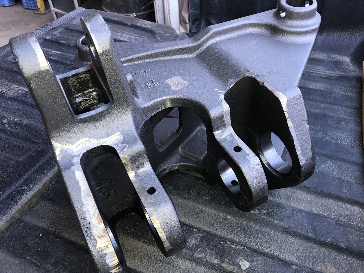 A piece of metal is sitting on top of a truck bed.