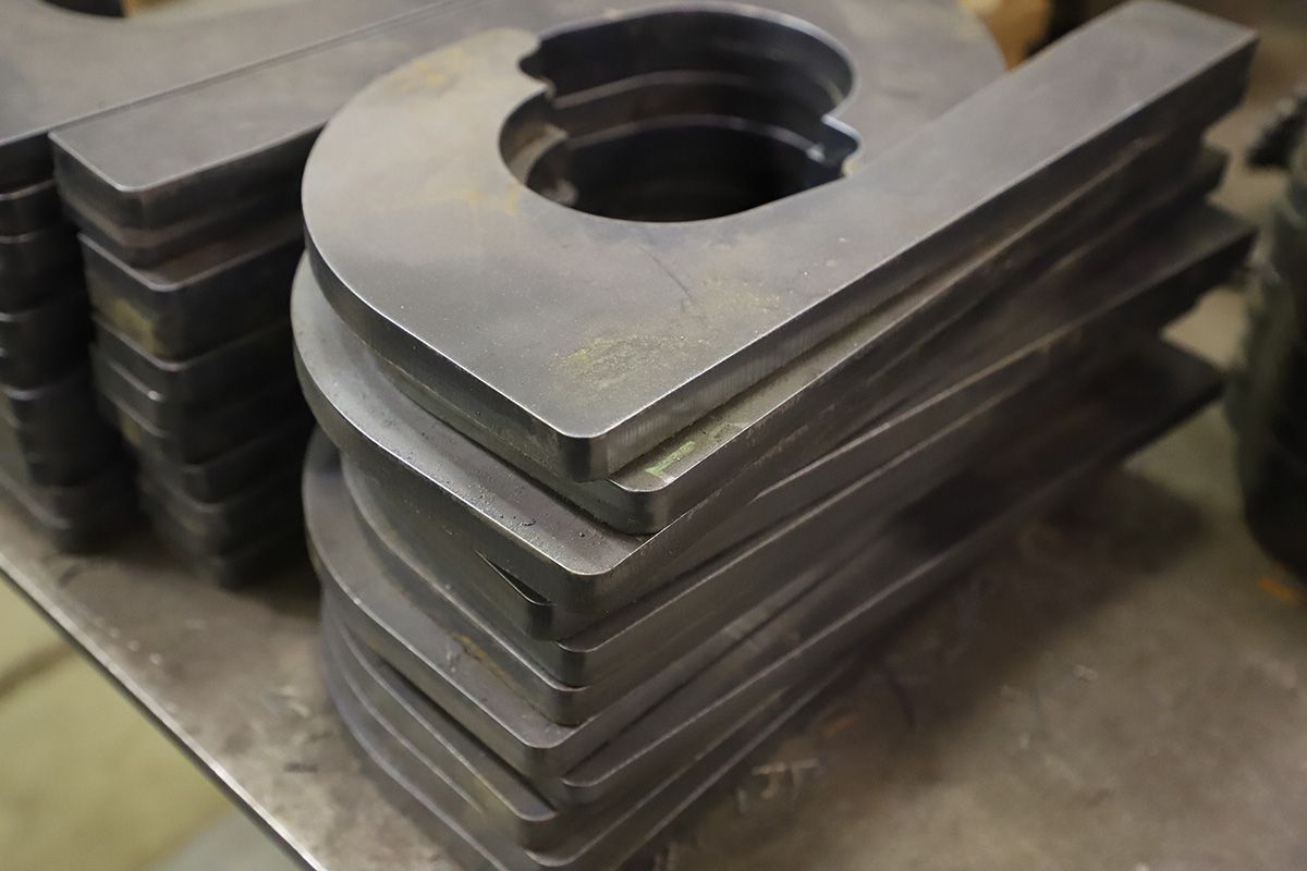 A stack of metal pieces sitting on top of each other on a table.