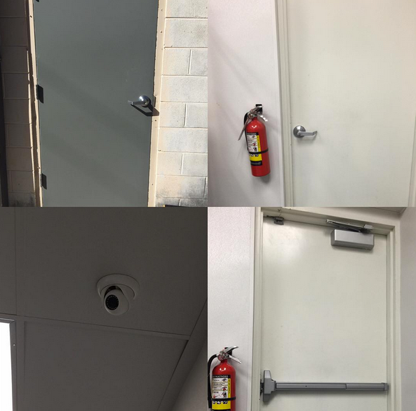 Hallway wall with gray and white doors, a red fire extinguisher, and a ceiling security camera.