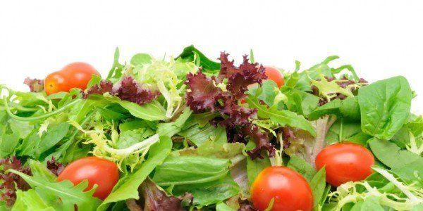 Salad with mixed greens and cherry tomatoes.