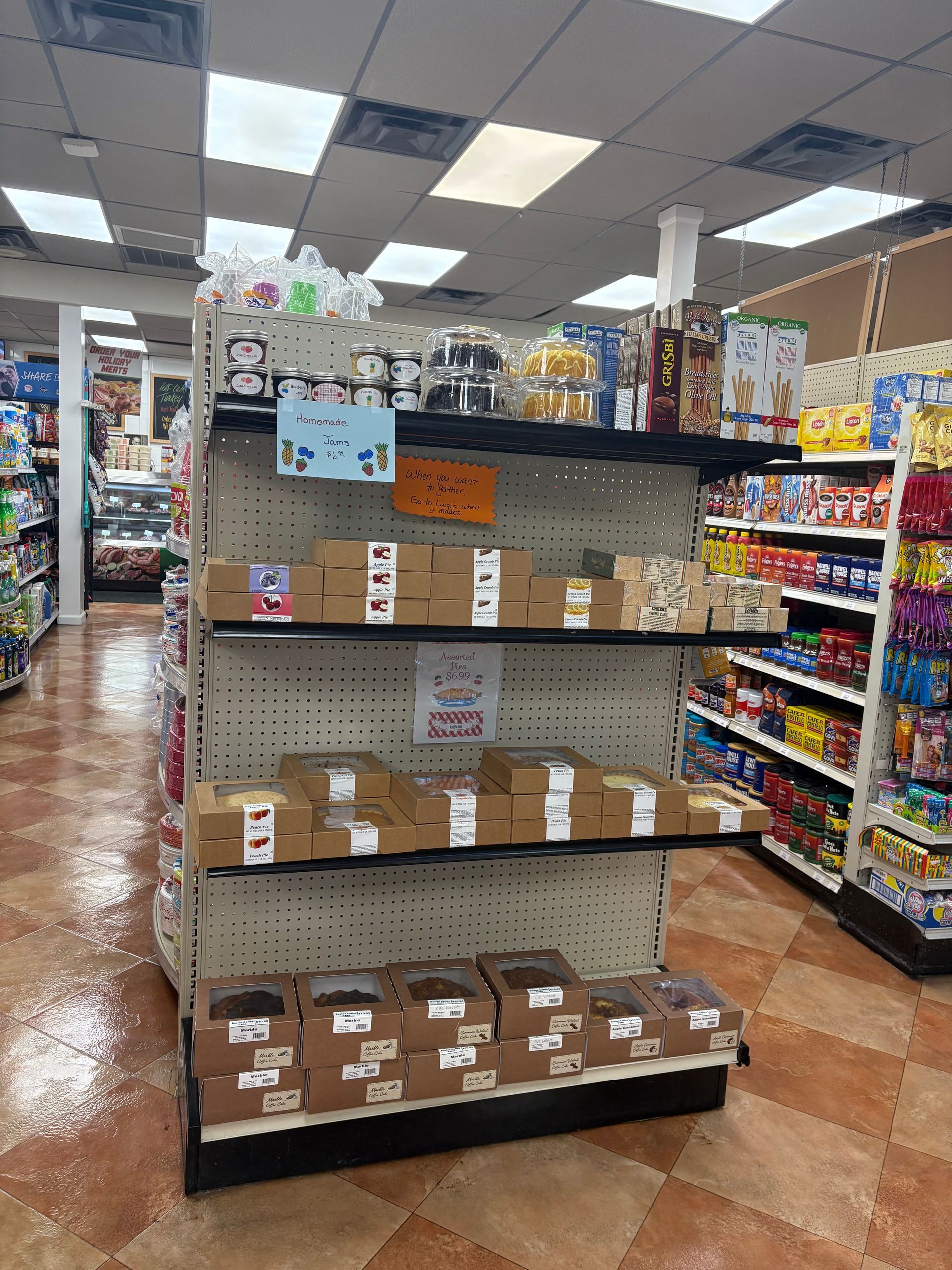 Shelves of packaged food items in a store aisle.