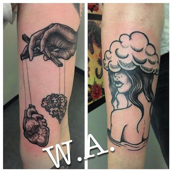 Two arm tattoos: a hand puppeteering heart and brain; a woman with a cloud-shaped head.