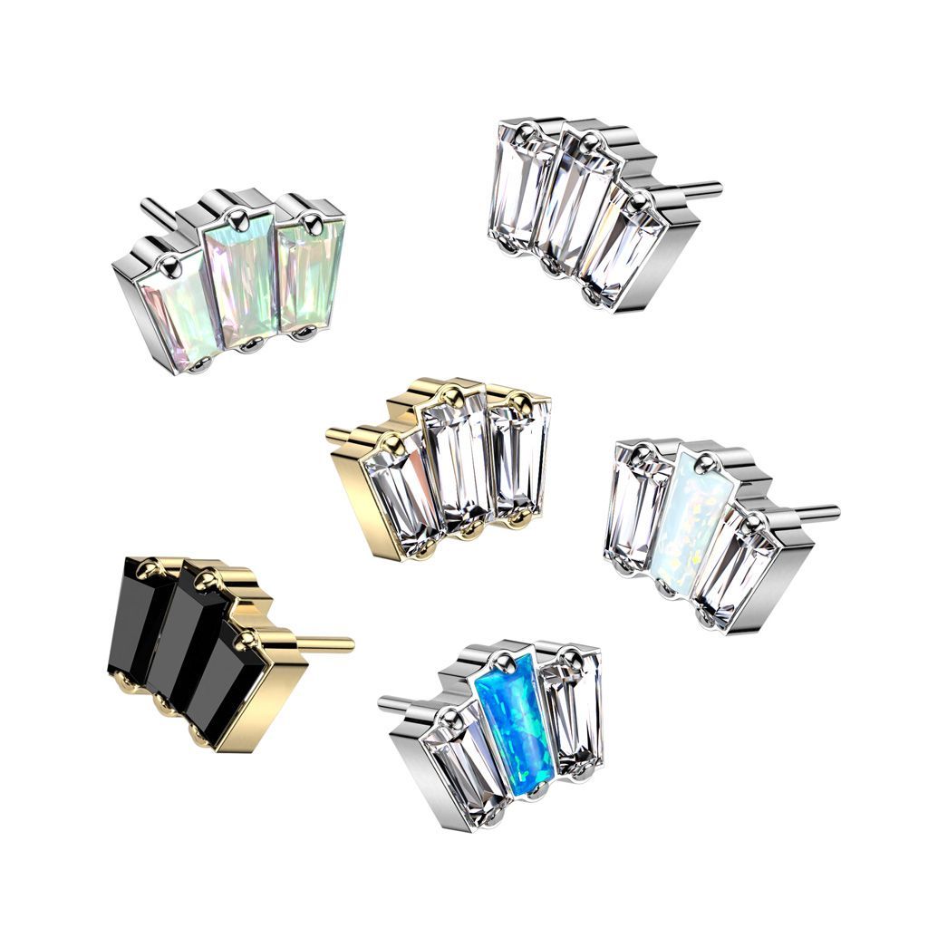 Six ear piercing studs with rectangular gems in various colors, arranged in a fan shape.
