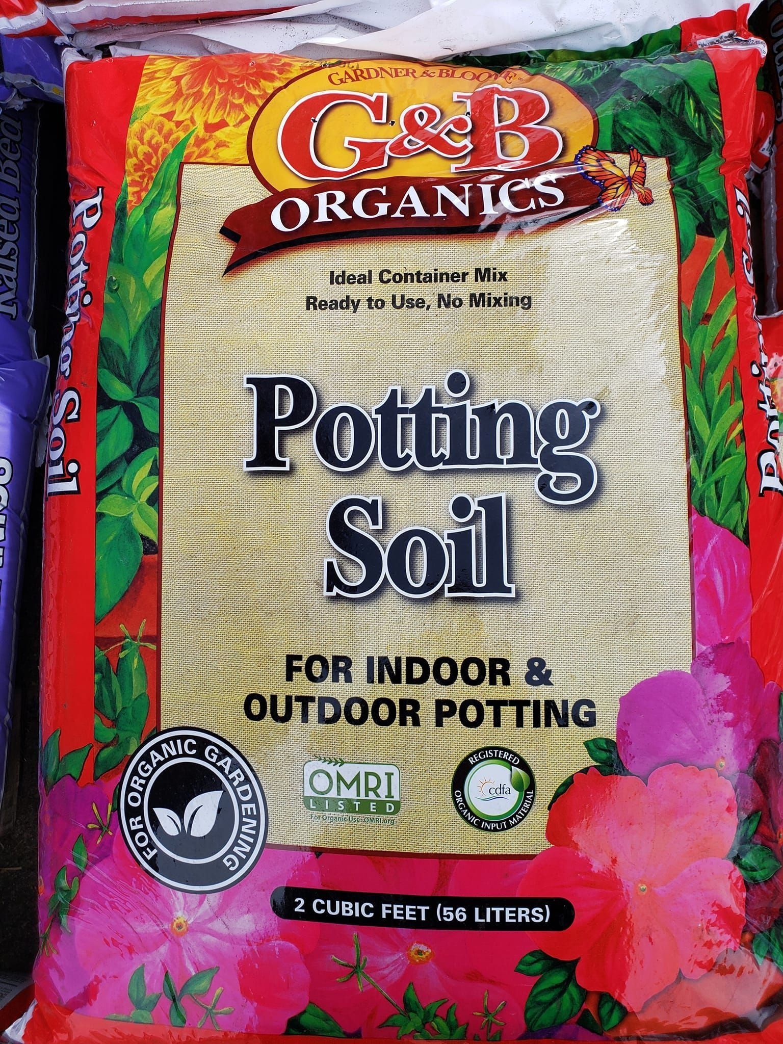 Bag of G&B Organics Potting Soil; red and yellow packaging, for indoor and outdoor use.