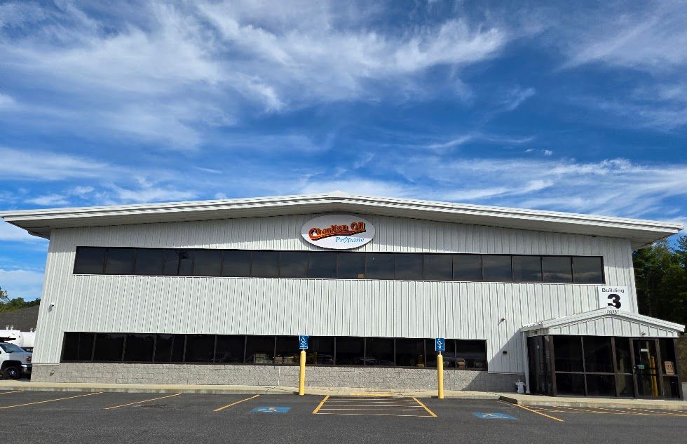 White building with large windows.