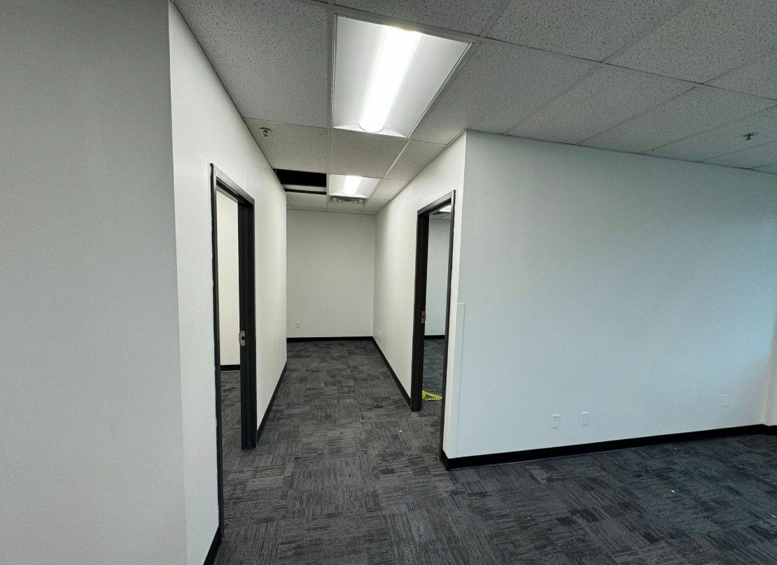 Interior commercial office painting project completed in West Des Moines Iowa by Harmony Painting.